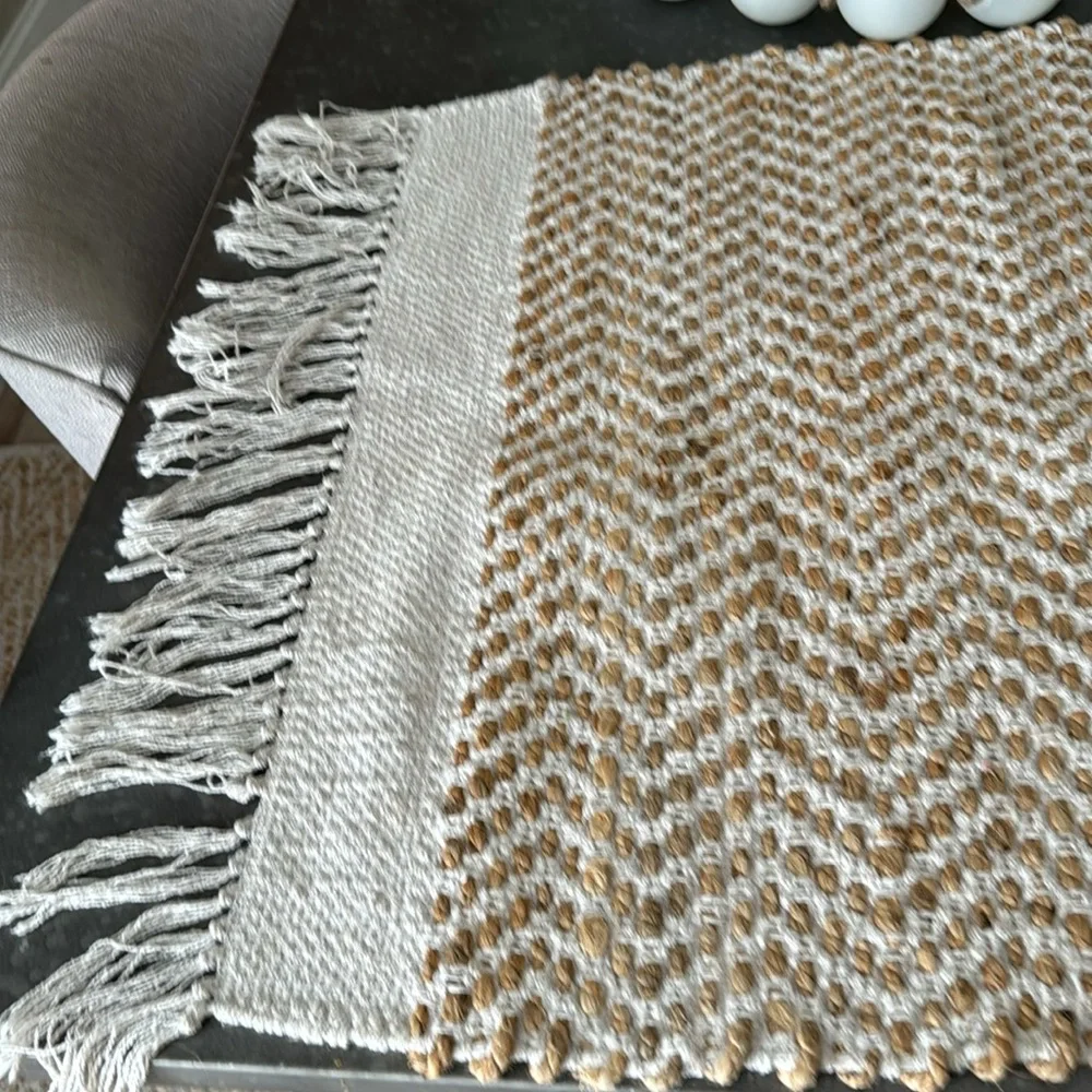 BNWOT Handwoven Beige and and White indoor rug.